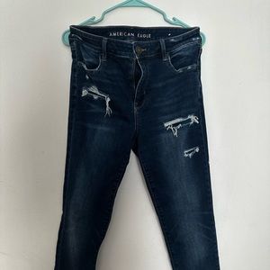 Distressed super stretch skinny jeans